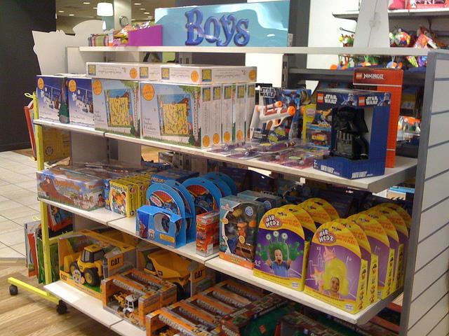 Store shelves filled with primary colors and boys’ toys